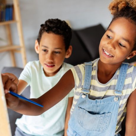 Concept of early childhood education, painting, talent, happy kids